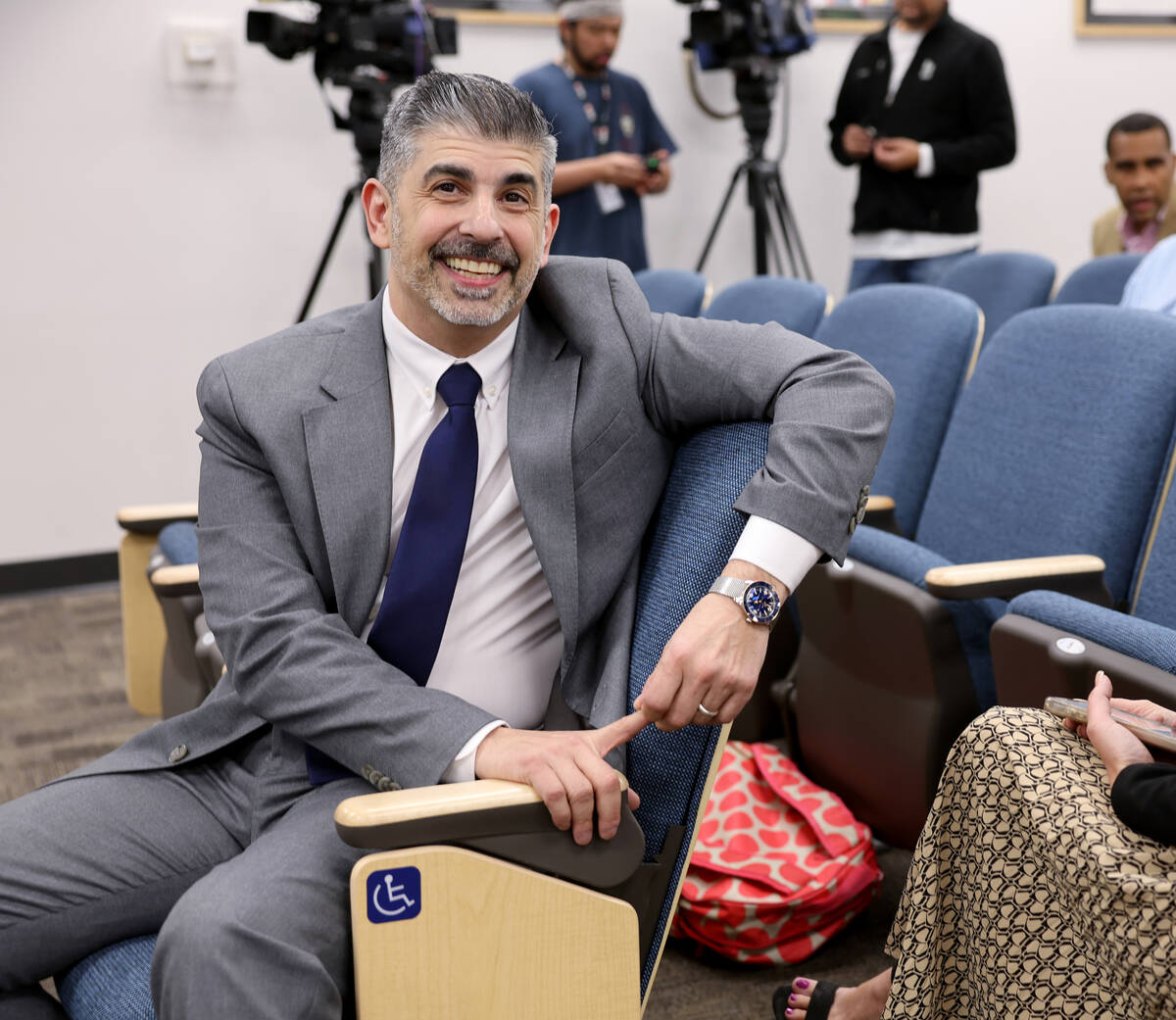 John Anzalone visits with members of the audience before answering questions from the Clark Cou ...