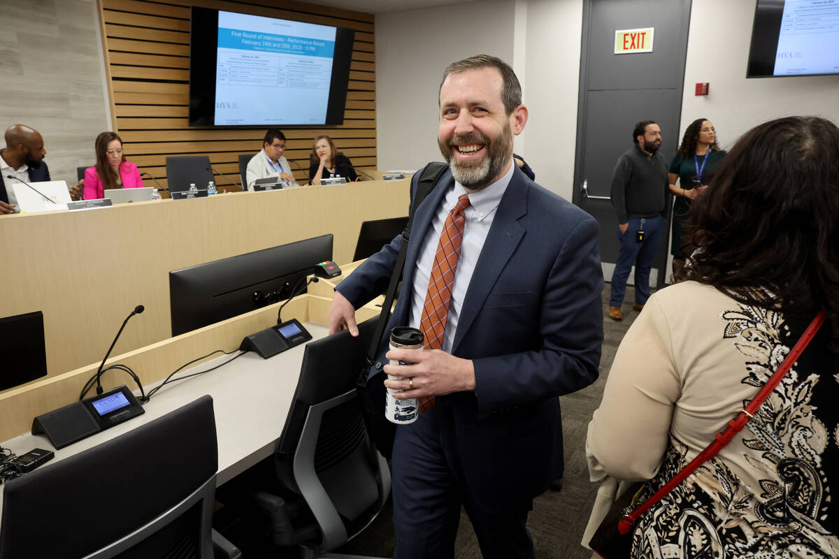 Jesse Welsh greets members of the audience before answering questions from the Clark County Sch ...