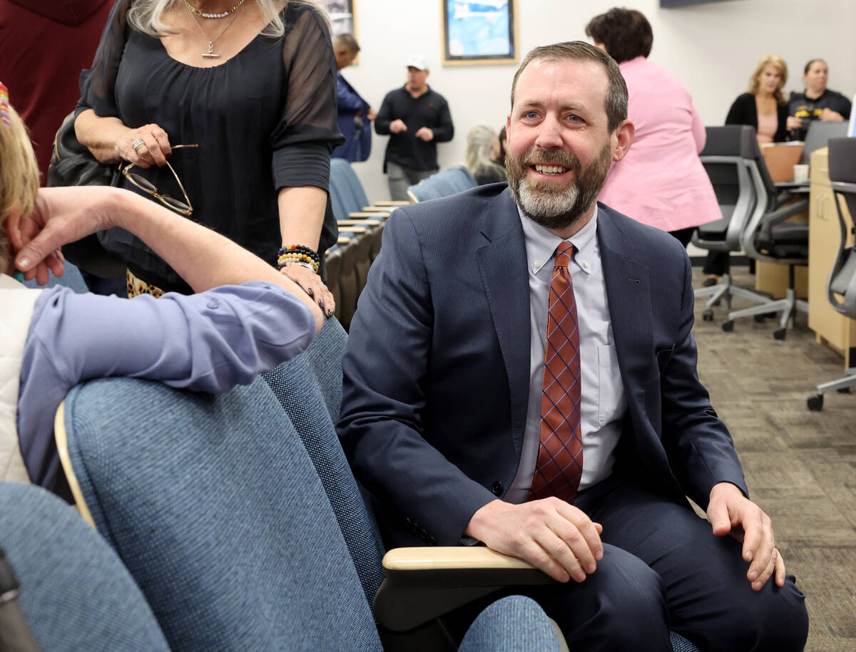 Jesse Welsh greets members of the audience before answering questions from the Clark County Sch ...