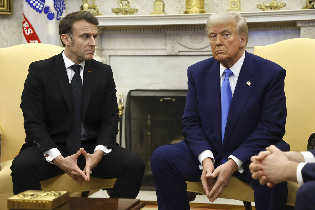President Donald Trump, right, meets with France's President Emmanuel Macron in the Oval Office ...