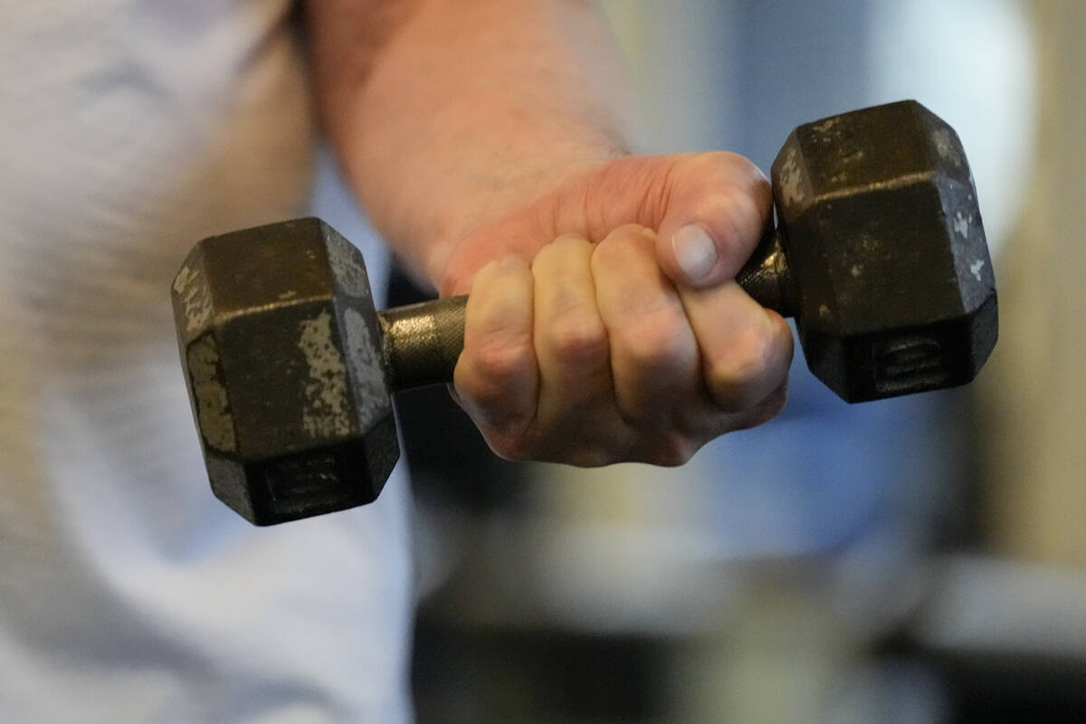 Dr. Grover Smith lifts a dumbbell at STEPS Fitness, Wednesday, Feb. 12, 2025, in Nashville, Ten ...