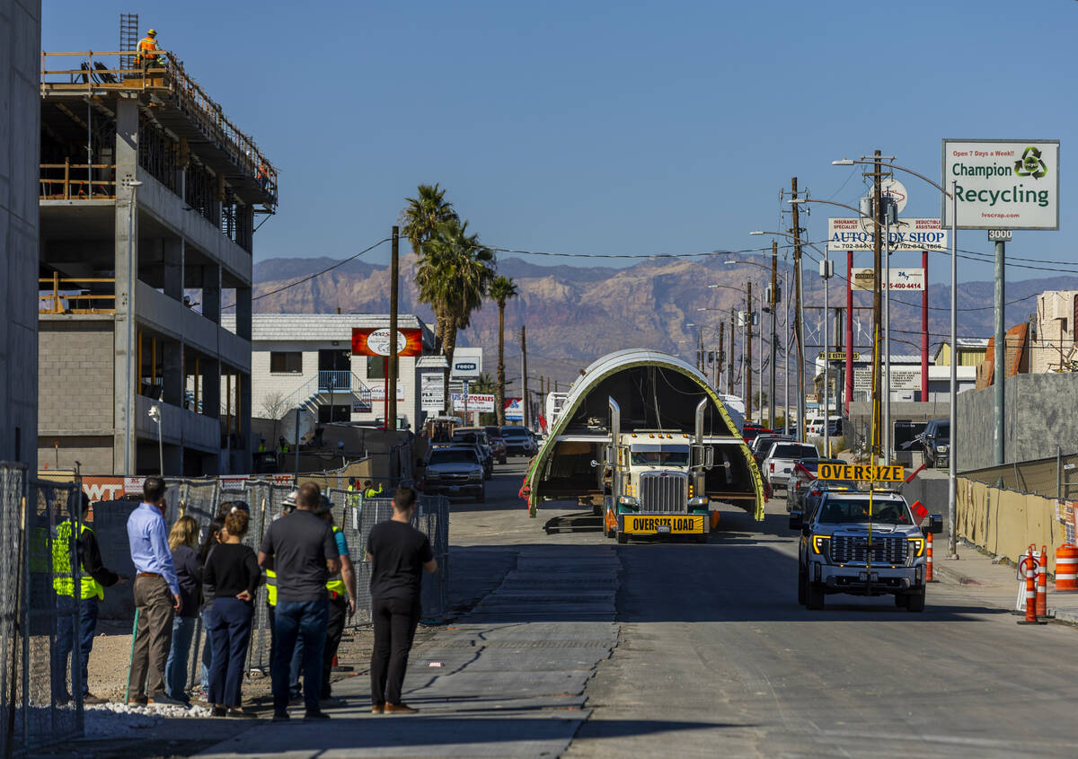 A decommissioned 747 fuselage section is transported along Meade Avenue to the expanded Area15 ...