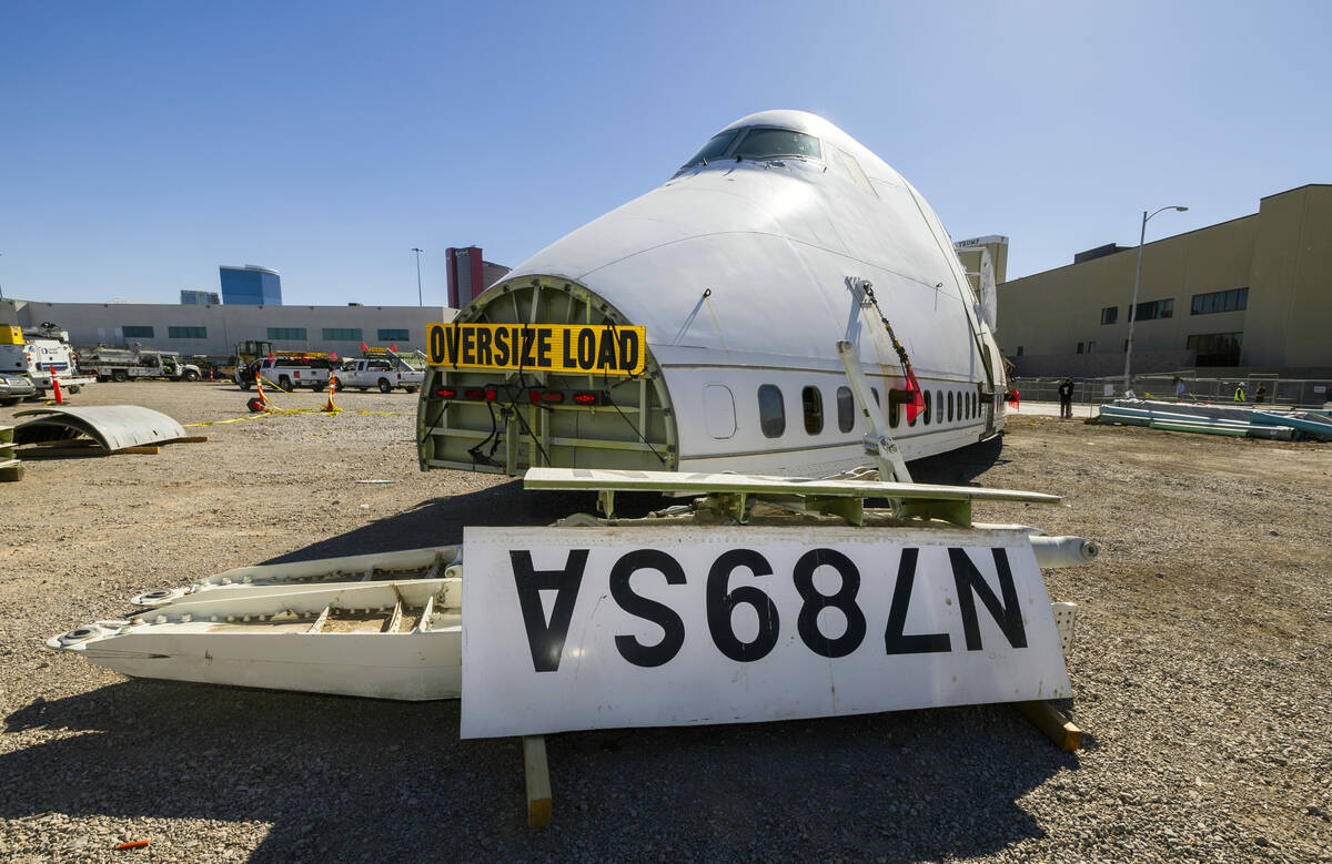 A decommissioned 747 fuselage section is placed amongst other parts after being transported alo ...