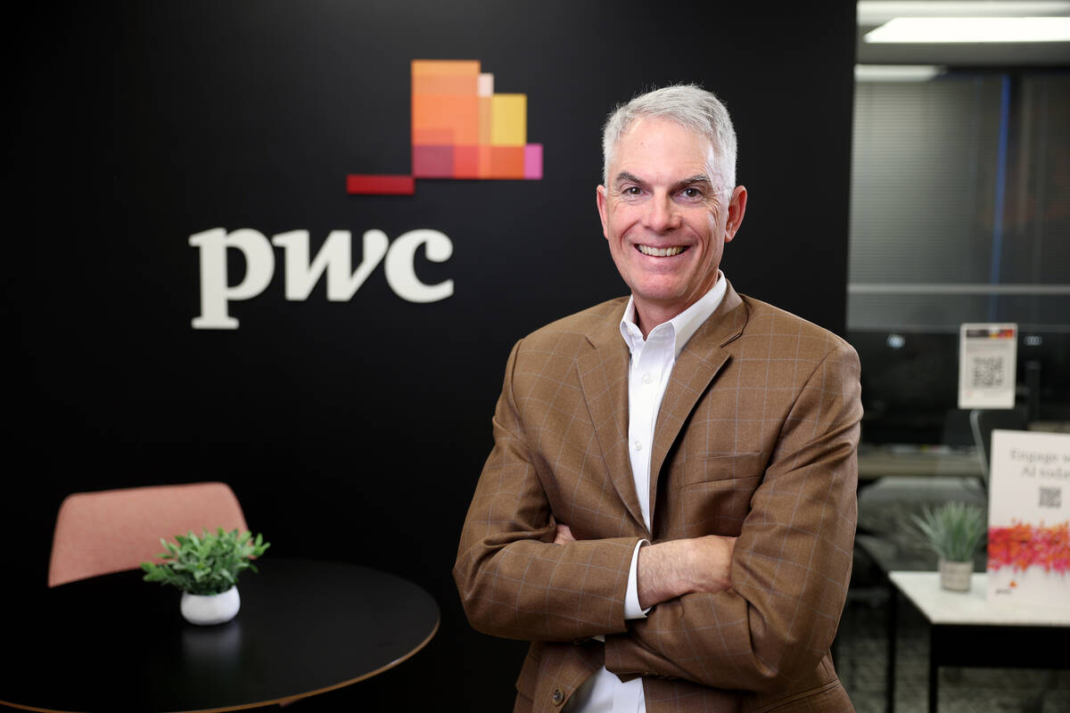 John Page, PwC's Las Vegas managing partner, poses for a portrait in his office at the Hughes C ...