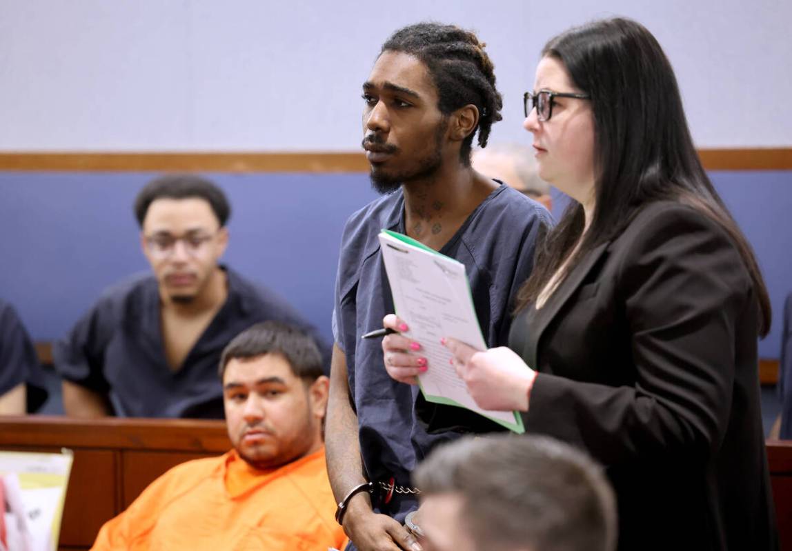 Tajon Walker, 23, one of three people arrested in connection with a 2021 bus stop slaying, appe ...