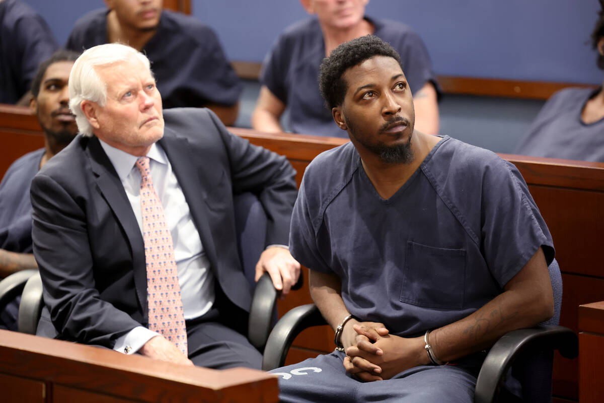 Devante Reynolds, 32, one of three people arrested in connection with a 2021 bus stop slaying, ...