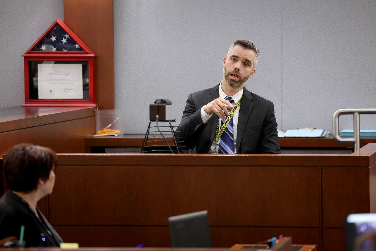 Las Vegas police homicide detective Jim Gollmer testifies during a bail hearing for three peopl ...