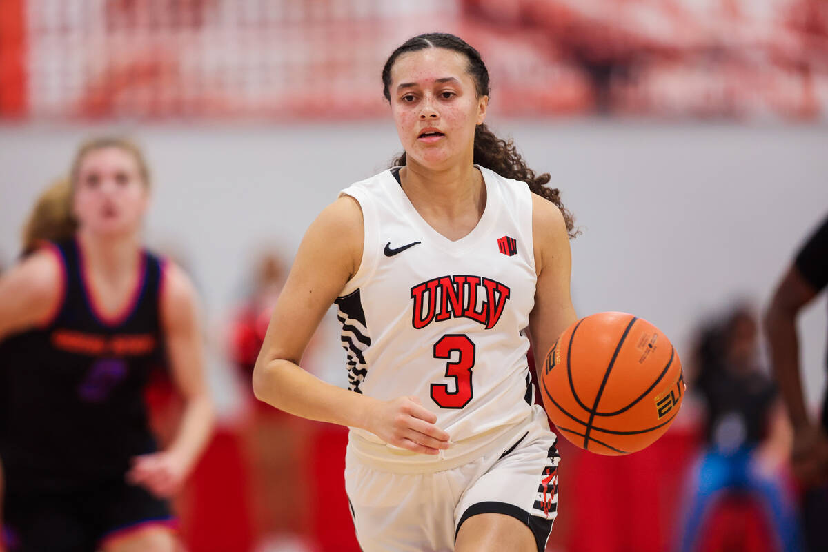 Lady Rebels guard Kiara Jackson (3) dribbles the ball during an NCAA women’s basketball ...