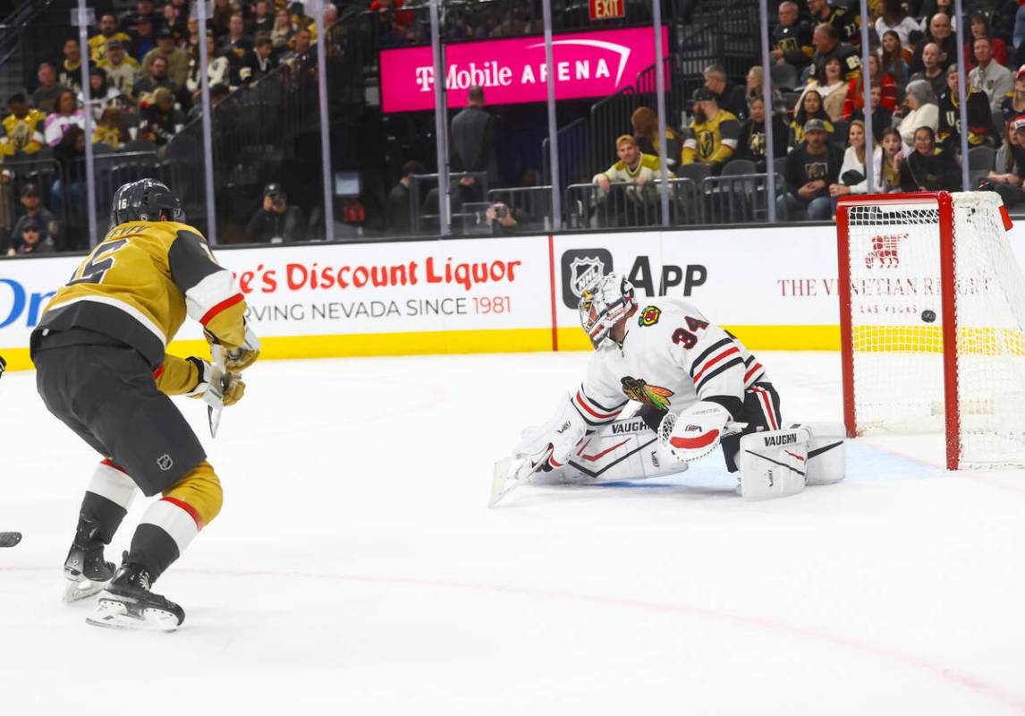 Golden Knights left wing Pavel Dorofeyev (16) scores a goal past Chicago Blackhawks goaltender ...