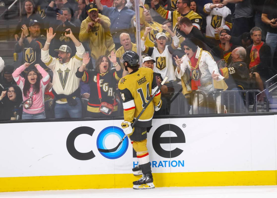 Golden Knights defenseman Nicolas Hague (14) celebrates his goal against the Chicago Blackhawks ...