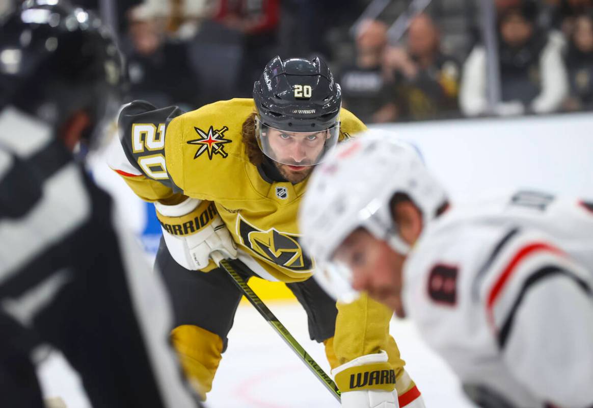 Golden Knights left wing Brandon Saad (20) looks on during a face-off against the Chicago Black ...