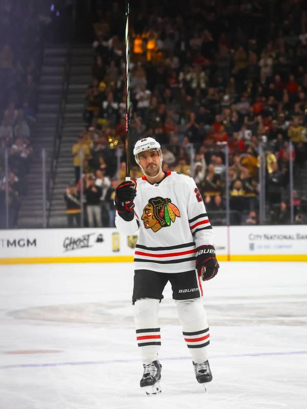 Chicago Blackhawks defenseman Alec Martinez, a former Golden Knights, acknowledges the crowd du ...