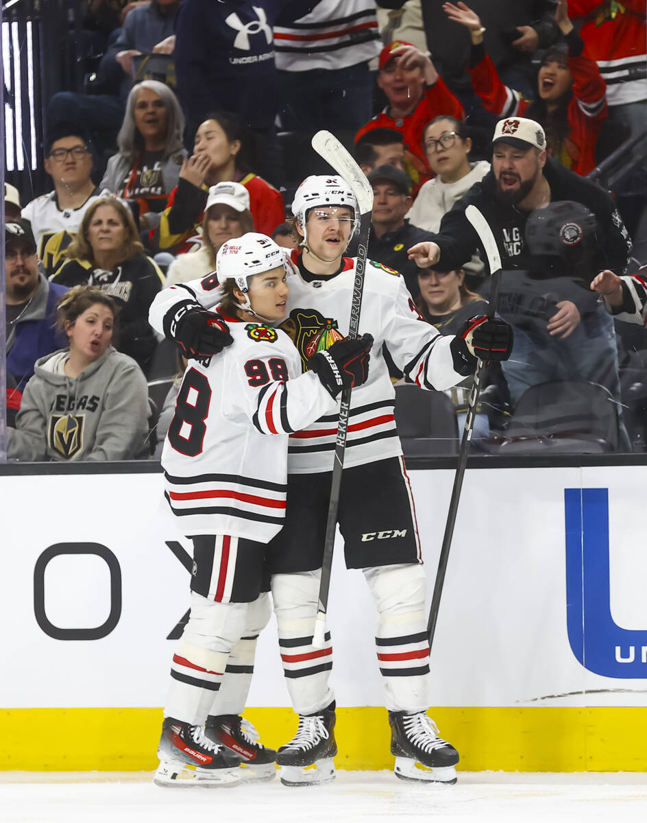 Chicago Blackhawks defenseman Ethan Del Mastro (38) celebrates his first career goal with Chica ...