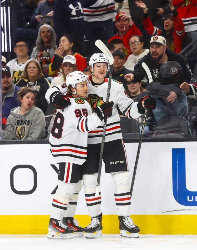 Chicago Blackhawks defenseman Ethan Del Mastro (38) celebrates his first career goal with Chica ...