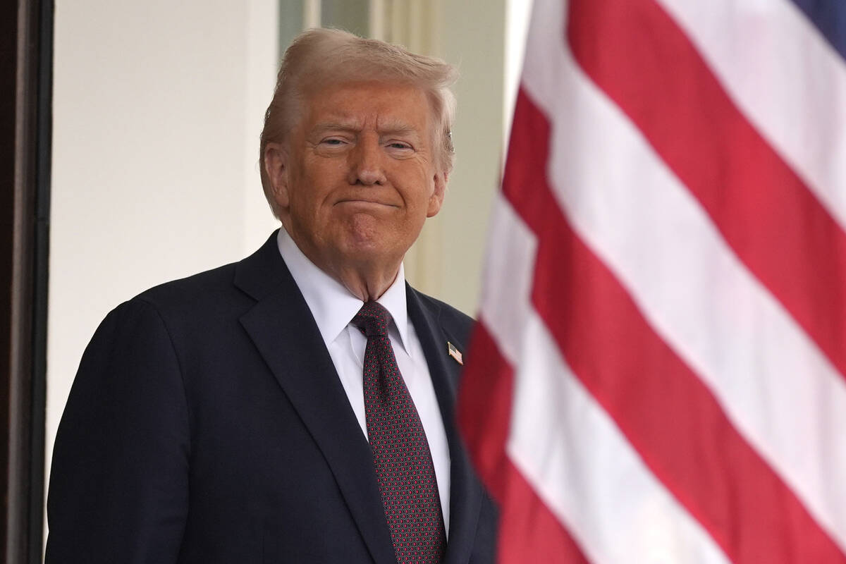 President Donald Trump stands before British Prime Minister Keir Starmer arrives at the White H ...