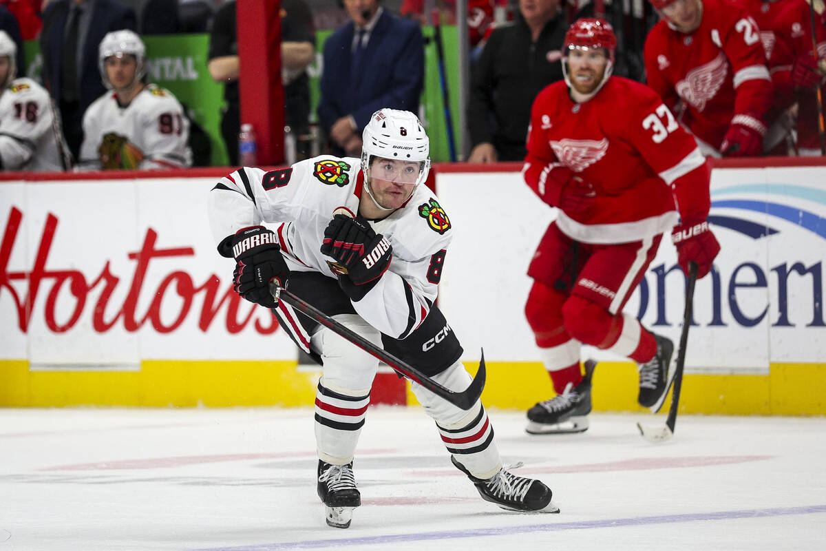 Chicago Blackhawks forward Ryan Donato (8) skates in the third period of an NHL hockey game aga ...
