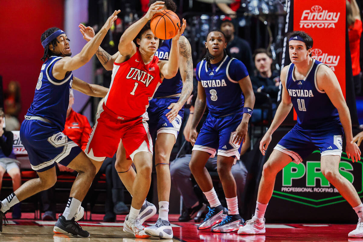 Rebels forward Jalen Hill (1) catches the ball from a pass by a teammate during an NCAA men&#x2 ...