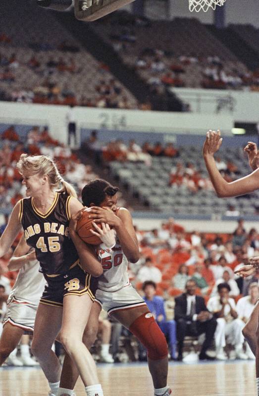 UNLVs Pauline Jordan, right, and Long Beach States Kari Parriot fight for the ball during champ ...