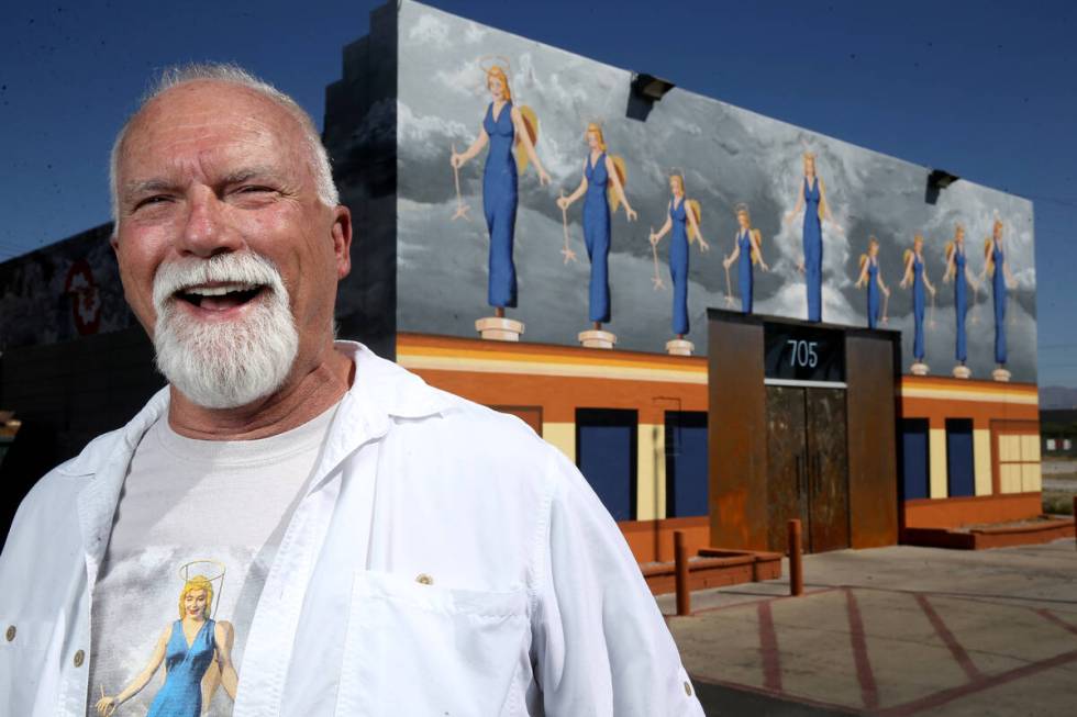 James Stanford with part of his mural, "A Phalanx of Angels Ascending" on the 705 Building at 7 ...