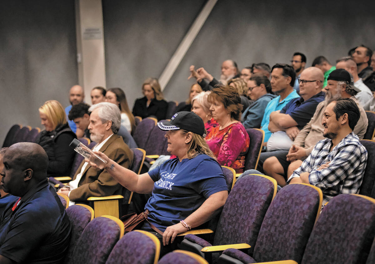 Members of the crowd voice their support of embattled Henderson Police Chief Hollie Chadwick du ...
