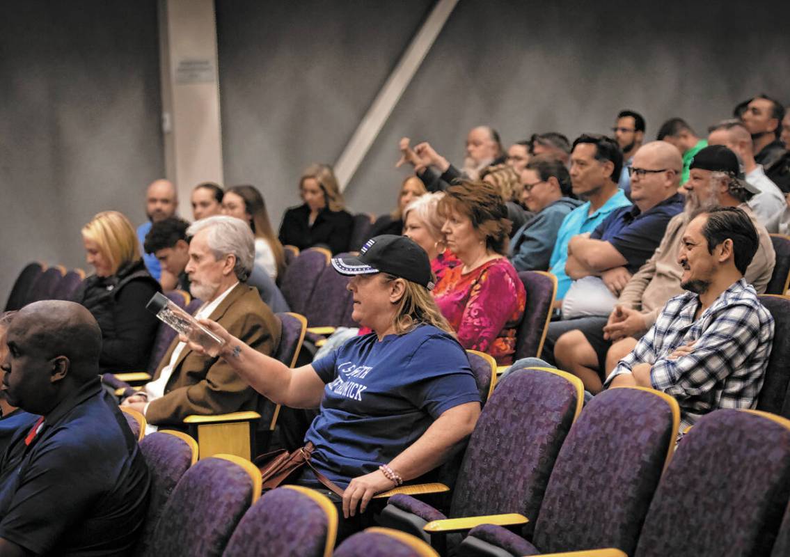Members of the crowd voice their support of embattled Henderson Police Chief Hollie Chadwick du ...