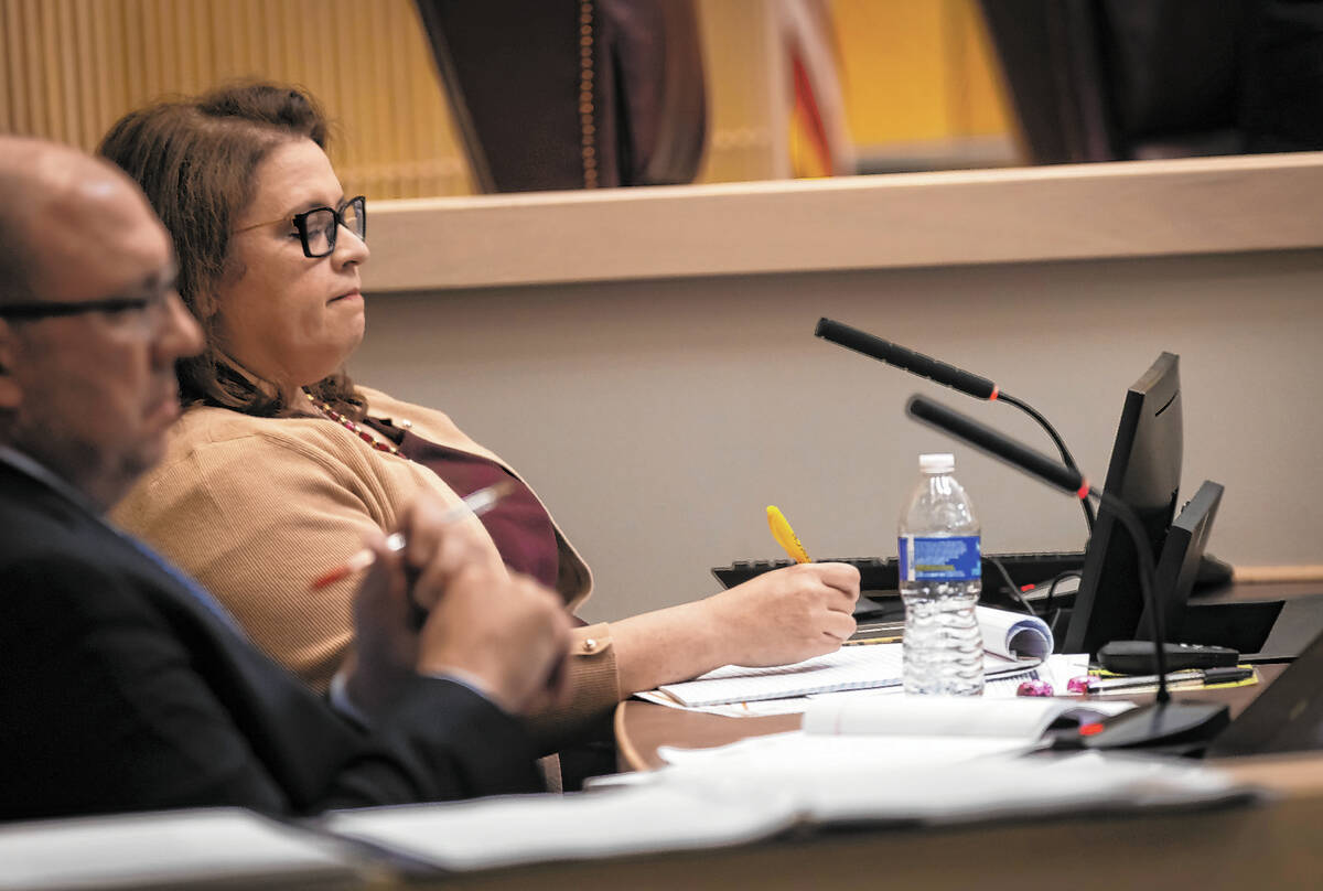Henderson City Manager Stephanie Garcia-Vause looks on while being addressed in public comment ...