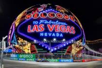 A race care navigates around the Sphere during the qualifying round for the Formula 1 Las Vegas ...