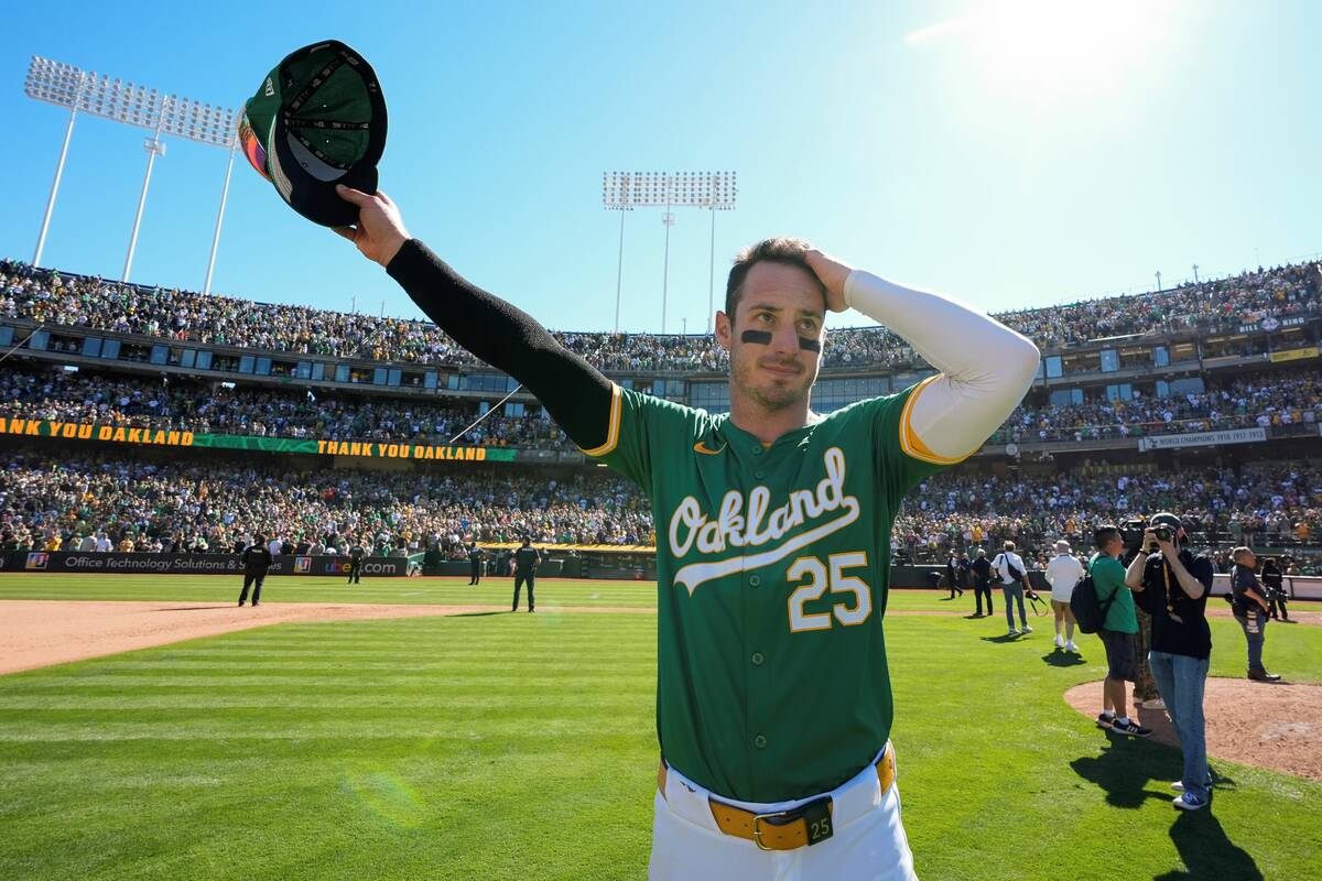The Oakland Athletics' Brent Rooker gestures to the crowd after a baseball game against the Tex ...