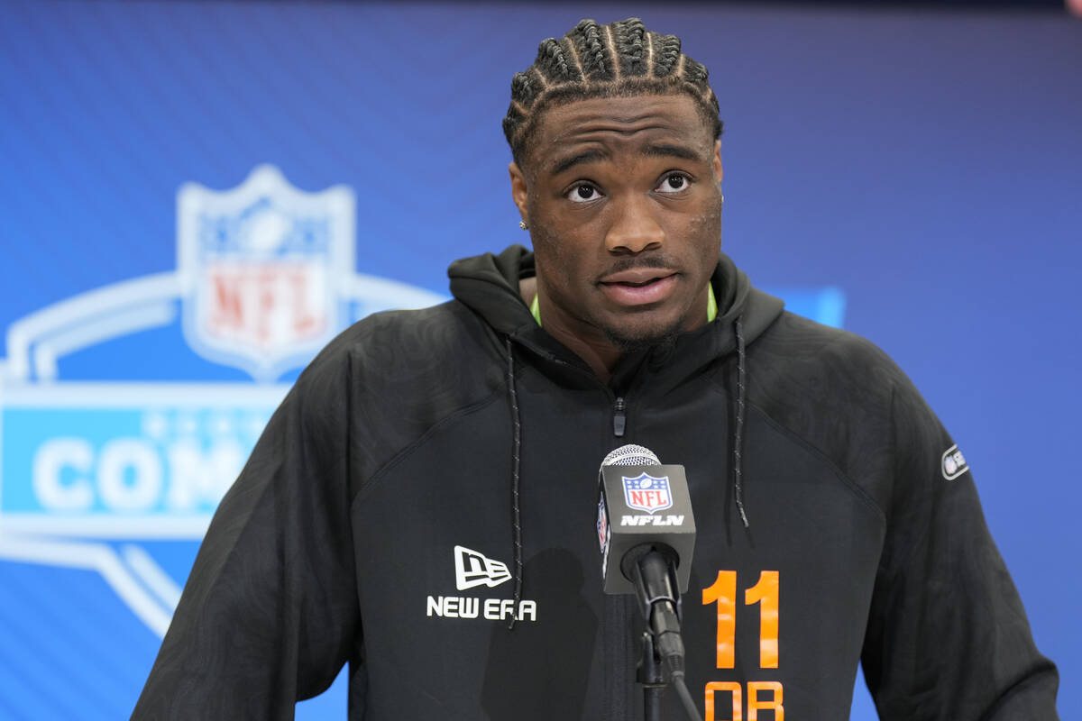 Alabama quarterback Jalen Milroe speaks during a press conference at the NFL football scouting ...