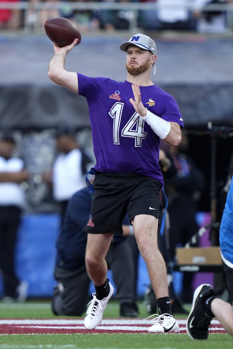 NFC quarterback Sam Darnold (14), of the Minnesota Vikings, passes against the AFC during the f ...
