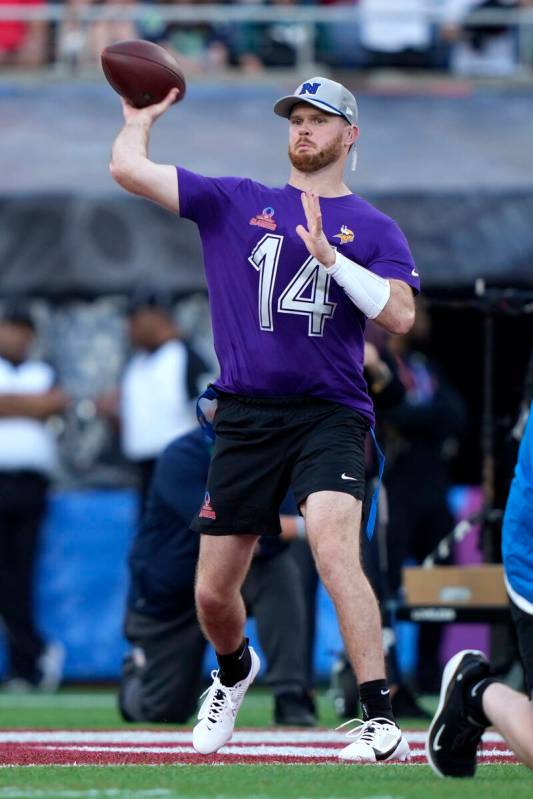NFC quarterback Sam Darnold (14), of the Minnesota Vikings, passes against the AFC during the f ...