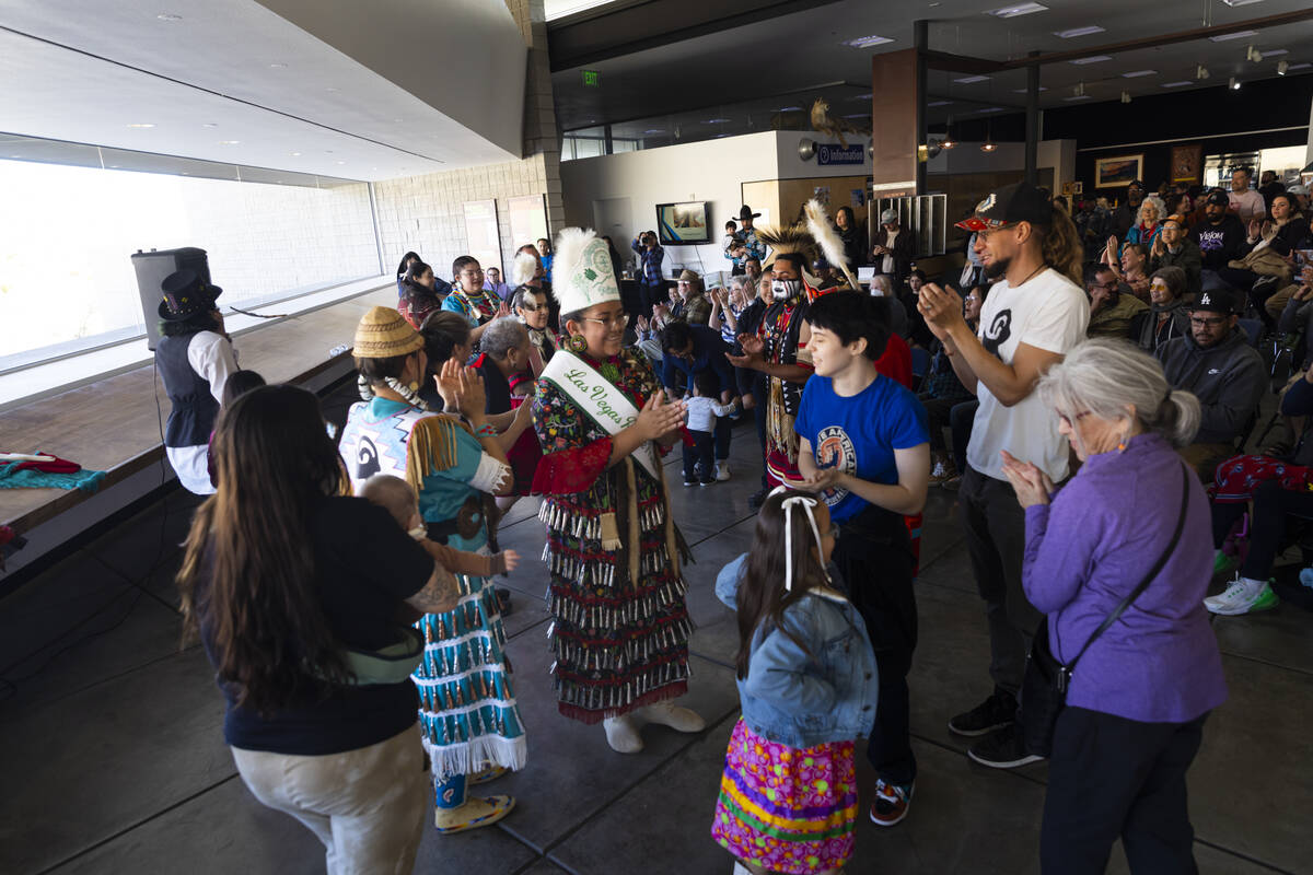 People clap at the end of a group dance during the Winter Gathering at the Red Rock Canyon Nati ...