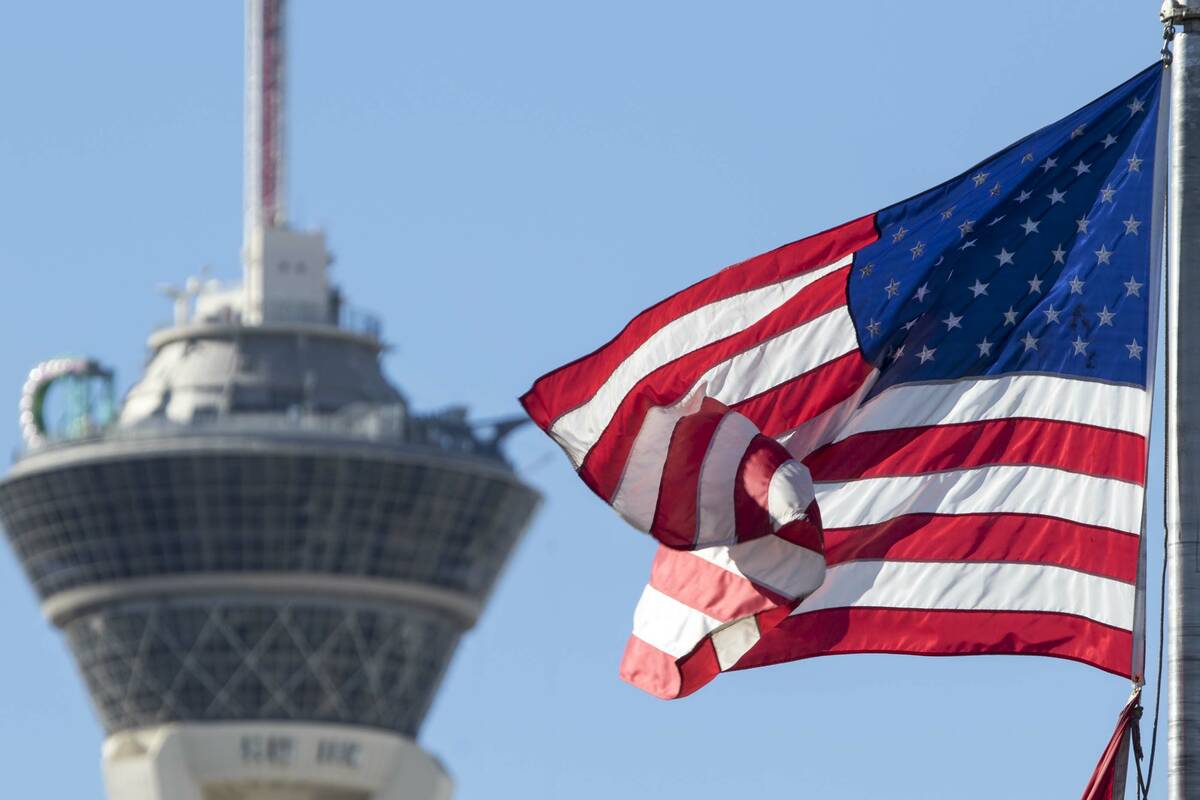 The American Flag blows in the wind as the Stratosphere. Las Vegas Review-Journal