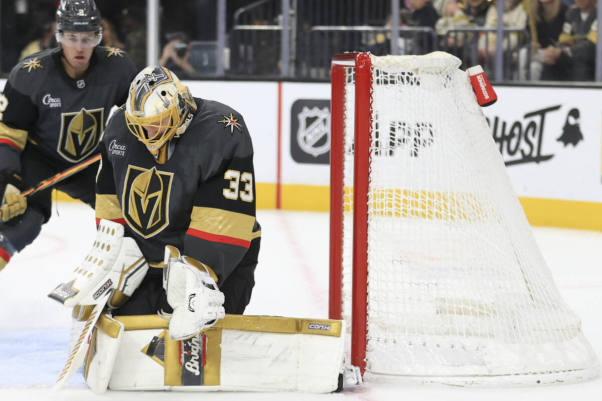 Vegas Golden Knights goaltender Adin Hill (33) makes a save during the first period of an NHL h ...