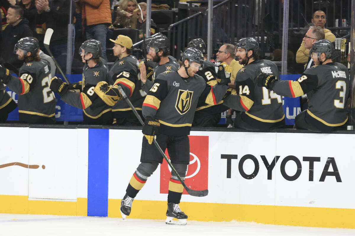 Vegas Golden Knights defenseman Noah Hanifin (15) celebrates after scoring a goal during the th ...