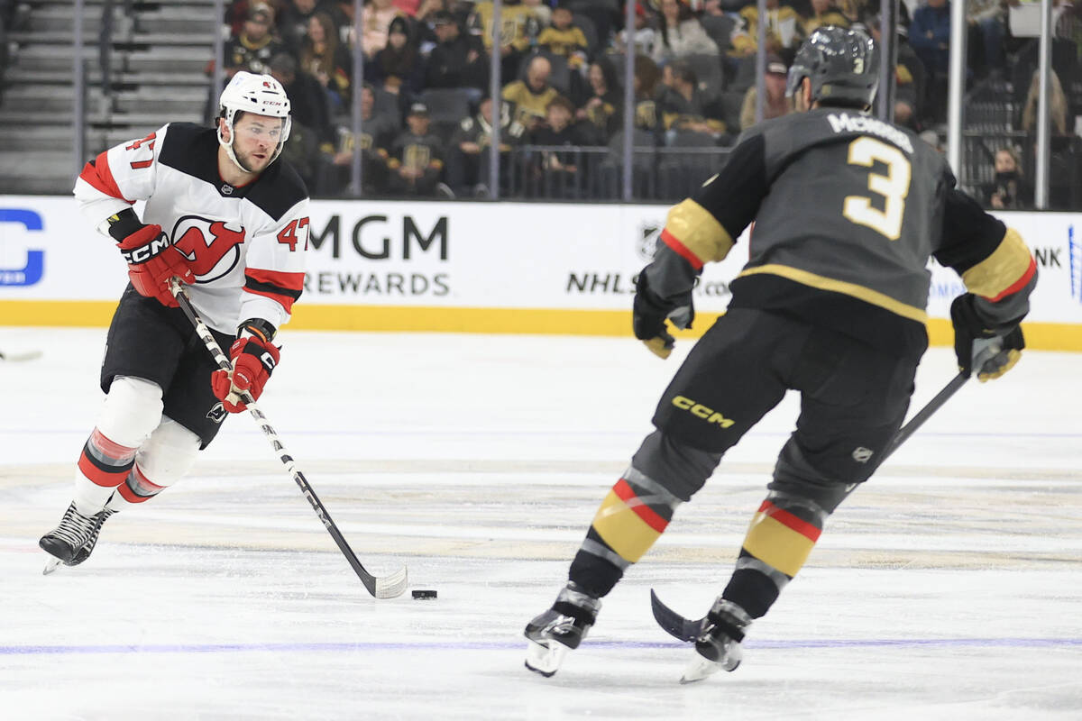 New Jersey Devils center Paul Cotter (47) skates against Vegas Golden Knights defenseman Brayde ...