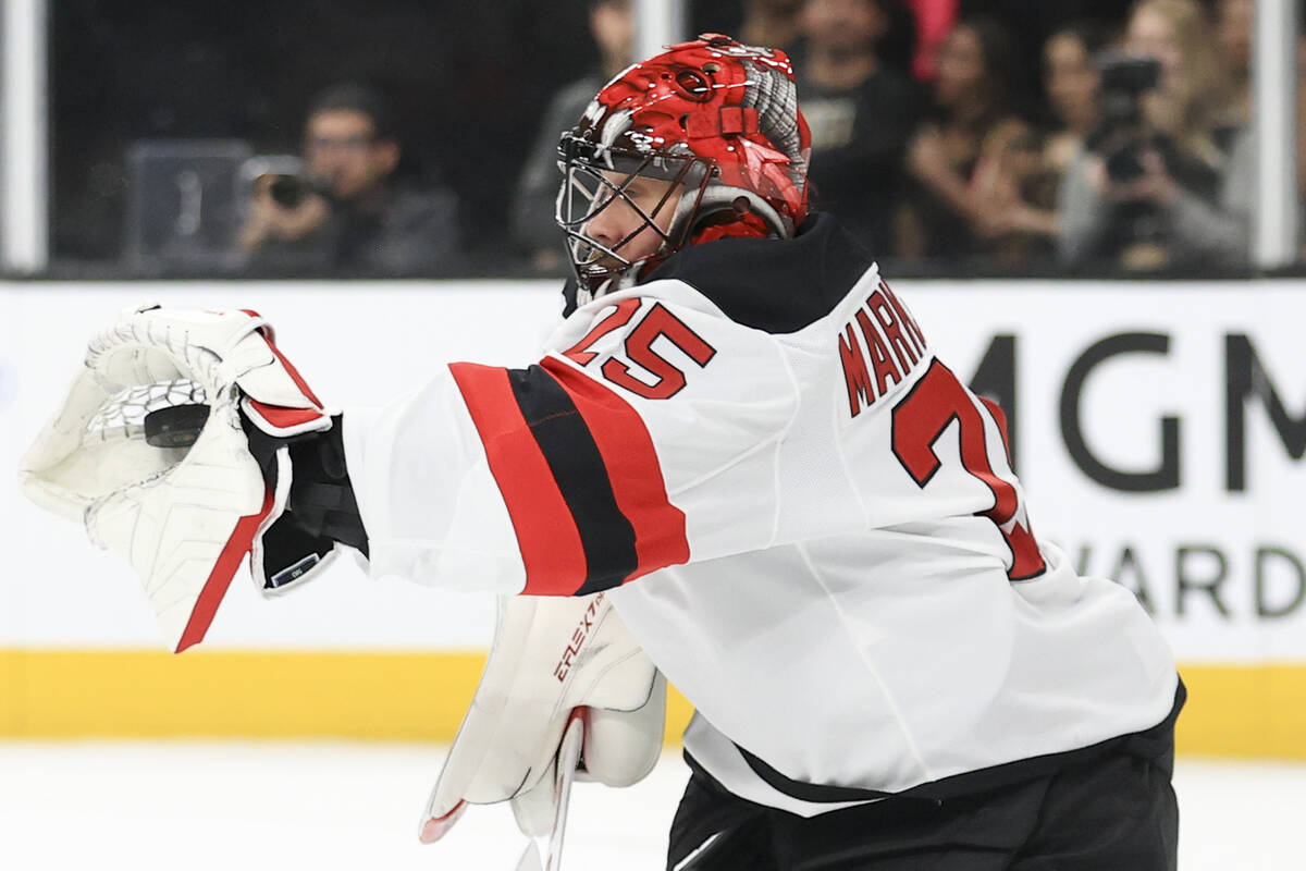 New Jersey Devils goaltender Jacob Markstrom makes a save during the second period of an NHL ho ...