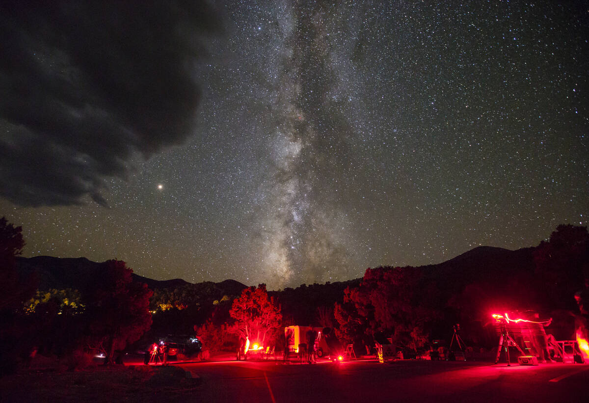 The Milky Way galaxy, along with Mars, center left, shines above Great Basin National Park duri ...