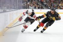 New Jersey Devils right wing Timo Meier (28) skates past Vegas Golden Knights defenseman Noah H ...