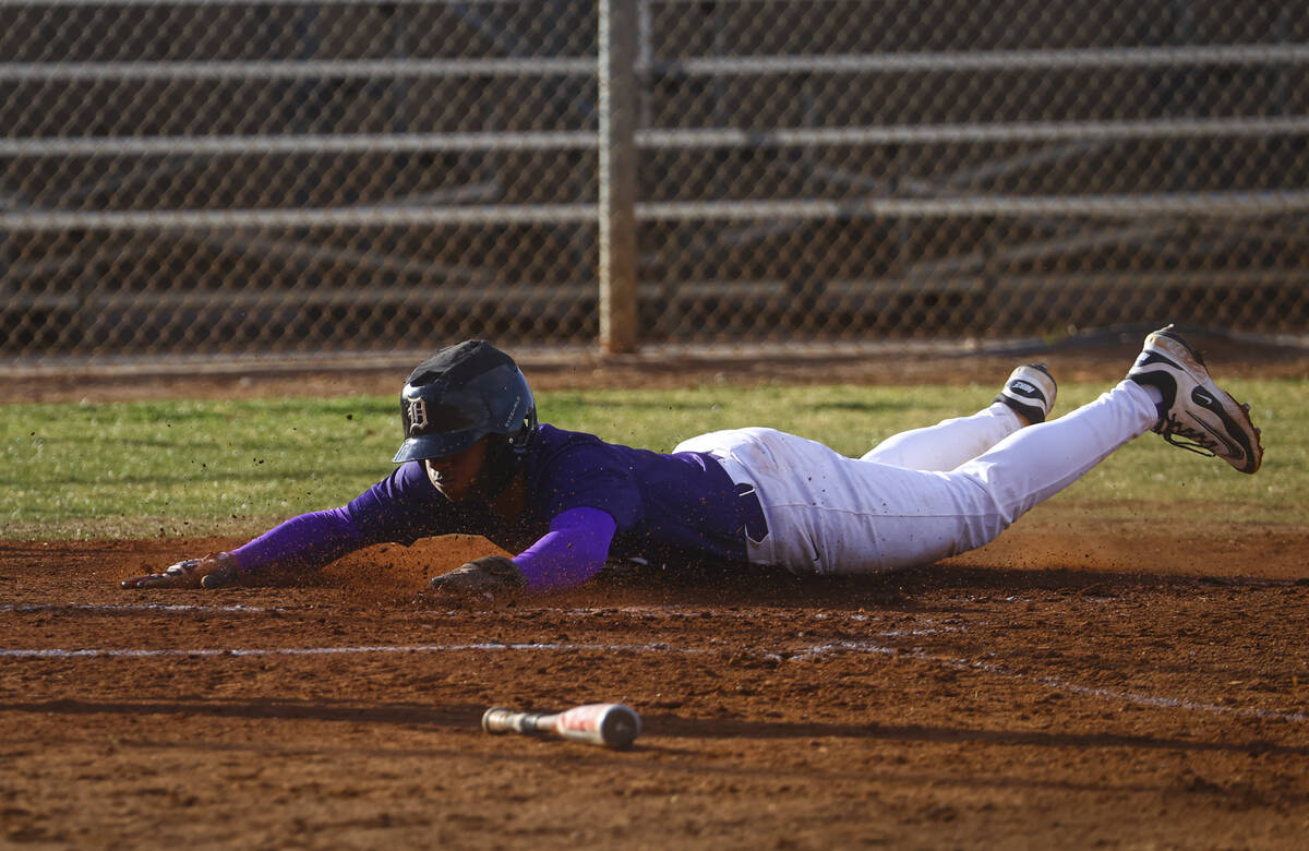 Durango's Alexander Mercurius (7) scores a run against Legacy during a baseball game at Durango ...