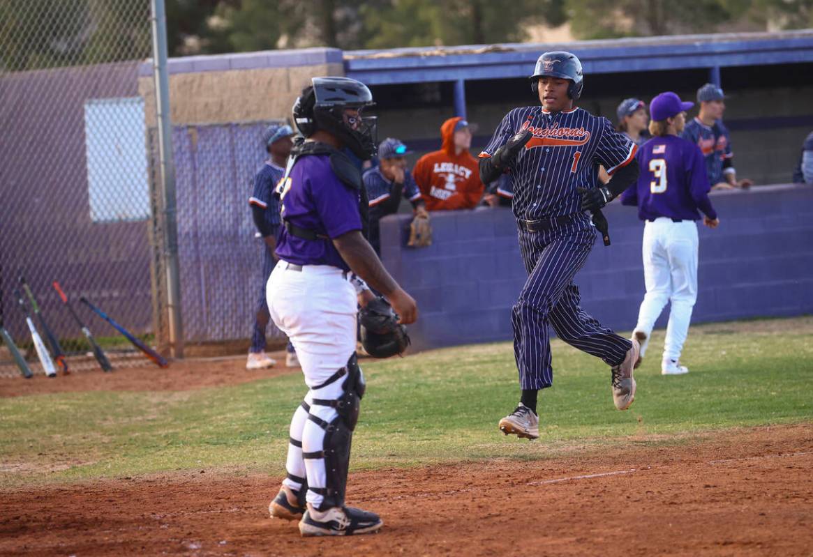 Legacy's Bomani Satterfield (1) scores a run during a baseball game at Durango High School on M ...