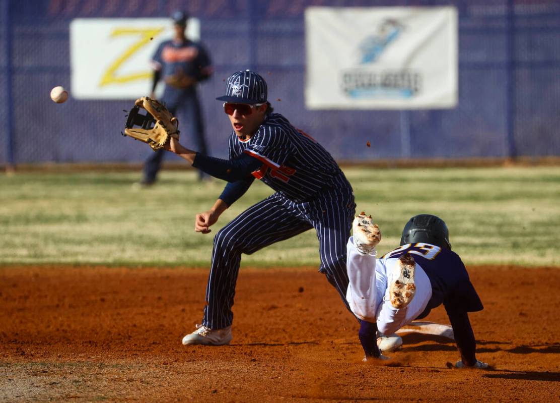 Legacy's Bringham Stosich (16) reaches to catch the ball to tag out Durango's Carson Crosby (23 ...