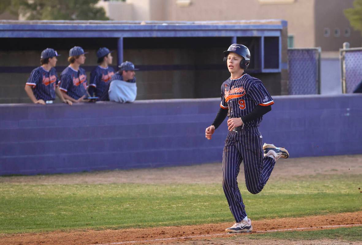 Legacy's Colby Stanton (9) runs for home to score a run during a baseball game at Durango High ...