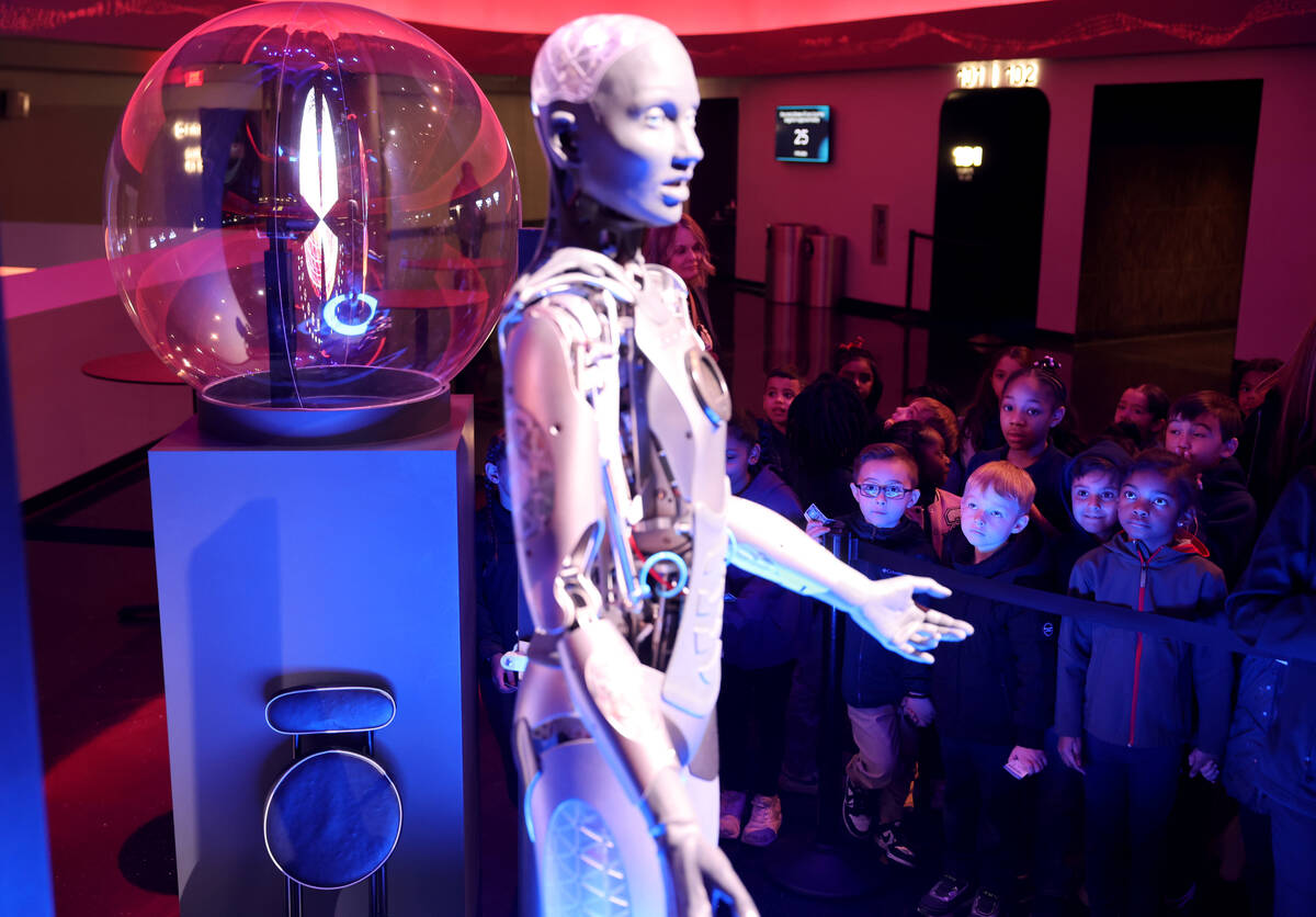 McCaw Elementary School students check out a robot at the Sphere on their way to seeing "Postca ...