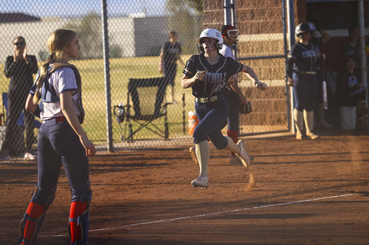 Foothill's Hailey Gilbertson (29) heads to home plate to score a run against Coronado during a ...