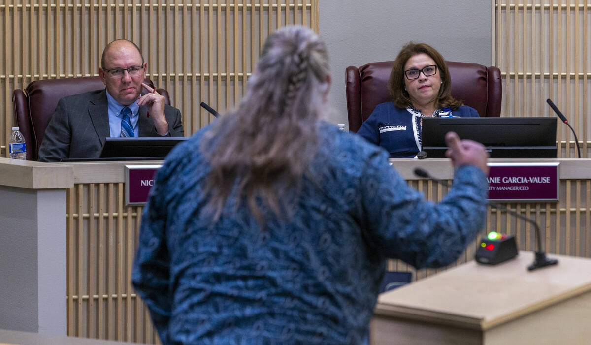 Former officer Chad Atkin has words of dismay for City Manger/CEO Stephanie Garcia-Vause, right ...