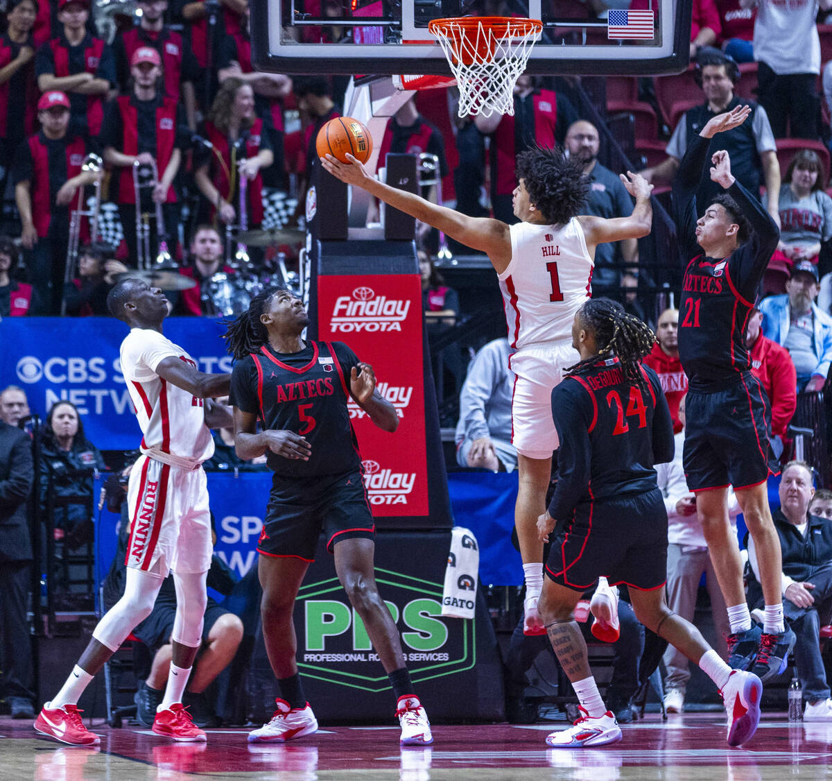 UNLV forward Jalen Hill (1) grabs a rebound over San Diego State Aztecs forward Pharaoh Compton ...