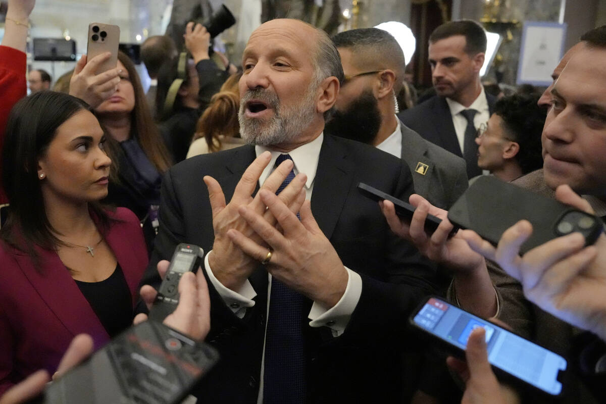 Secretary of Commerce Howard Lutnick speaks with reporters after President Donald Trump address ...