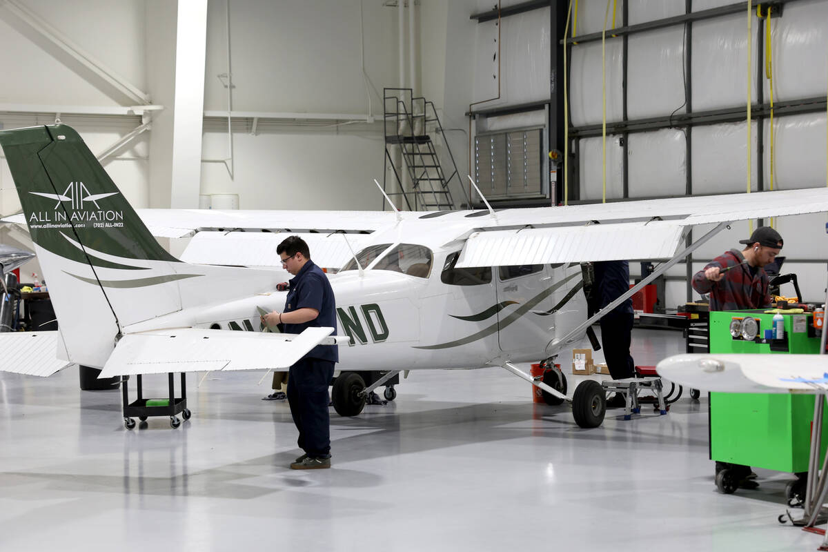 Technicians perform maintenance on airplanes at All In Aviation’s Henderson facility Wed ...