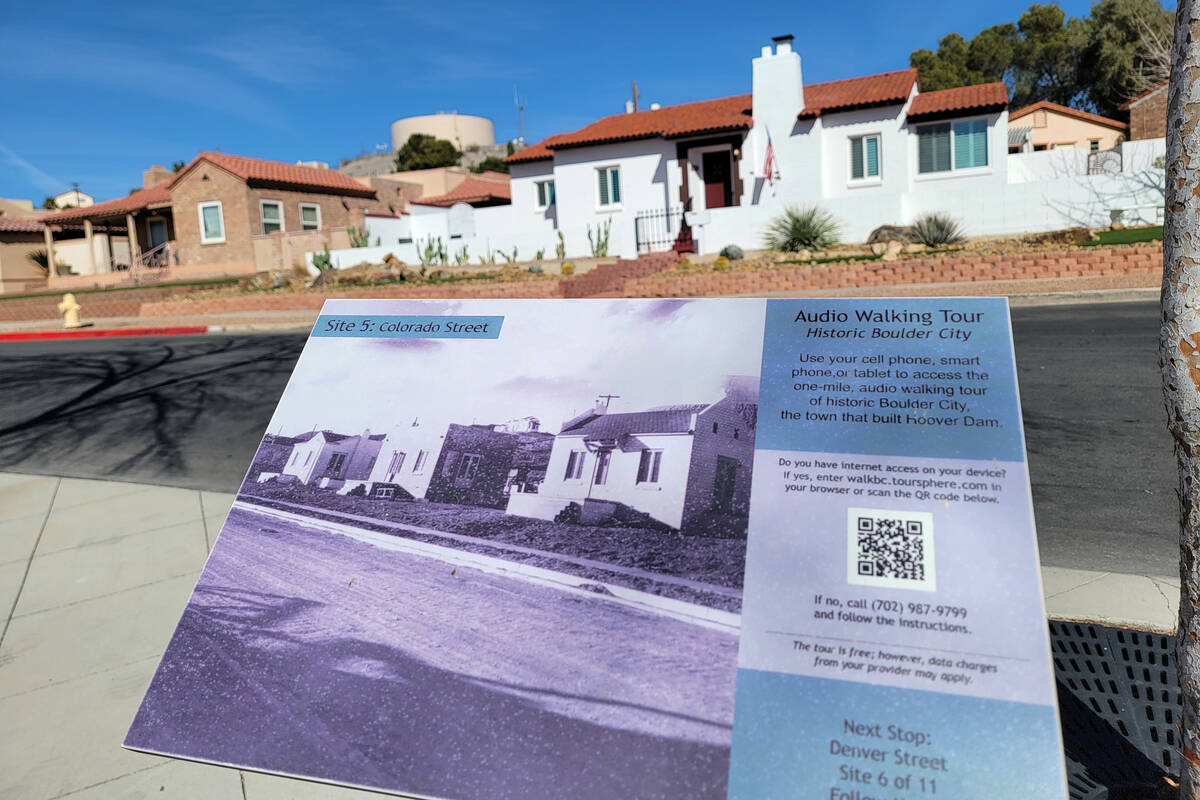 A historic walking tour sign helps with locating more information about the Bureau of Reclamati ...